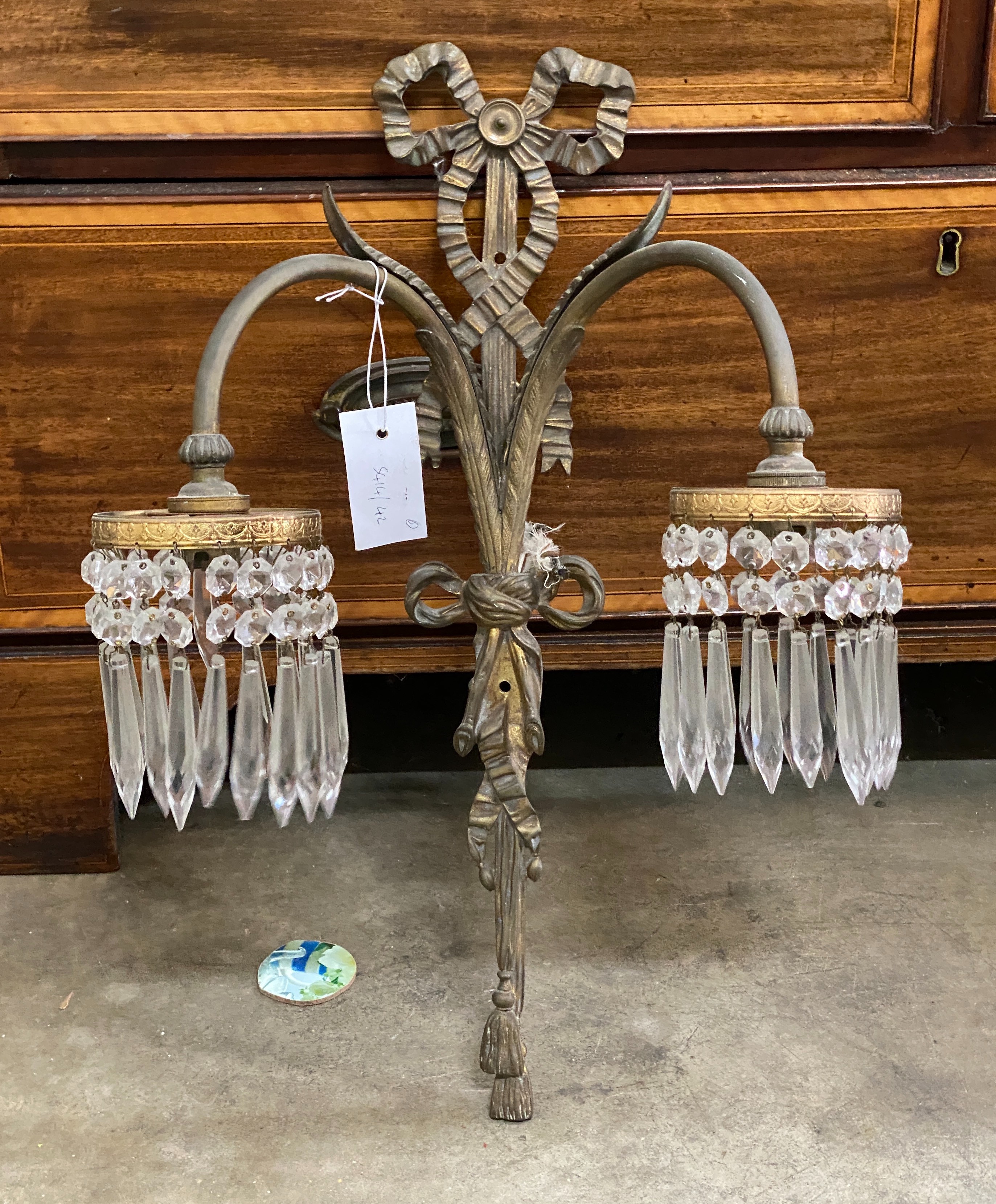 A set of eight gilt metal twin branch lustre wall lights, height 50cm